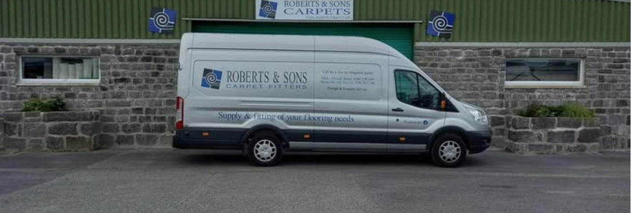 The Roberts & Sons Carpets van outside the business premises